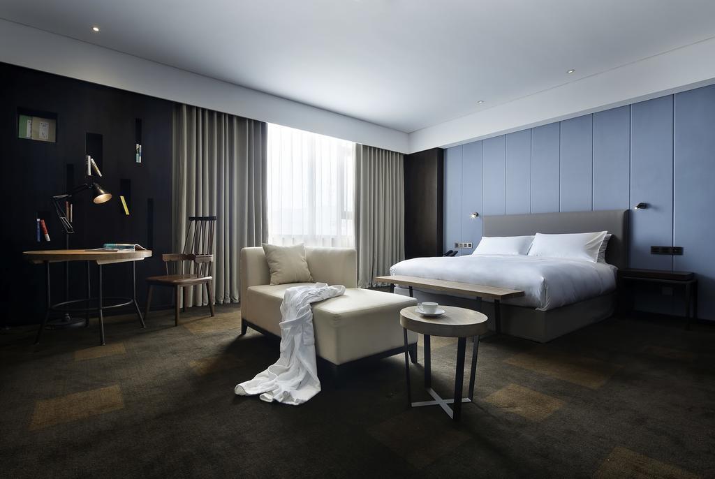 Ease House Luoyang Hotel ลั่วหยาง ห้อง รูปภาพ